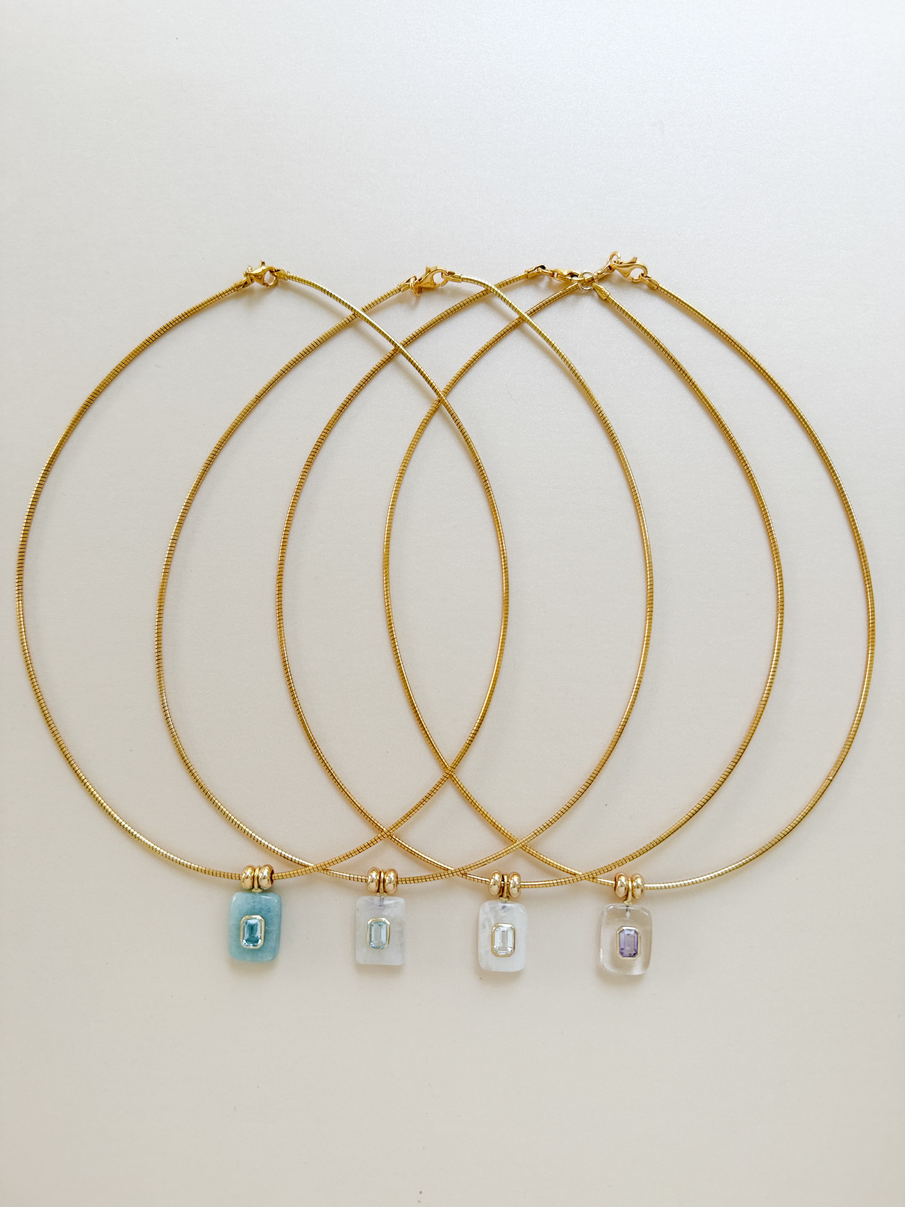 OMEGA EMERALD NECKLACE