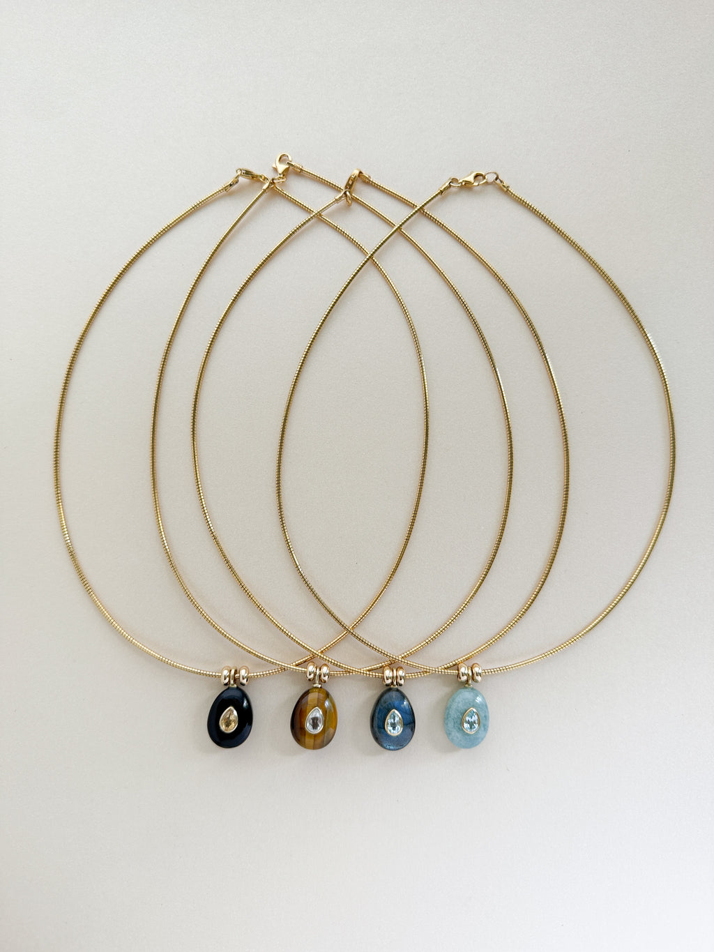 OMEGA DROP NECKLACE
